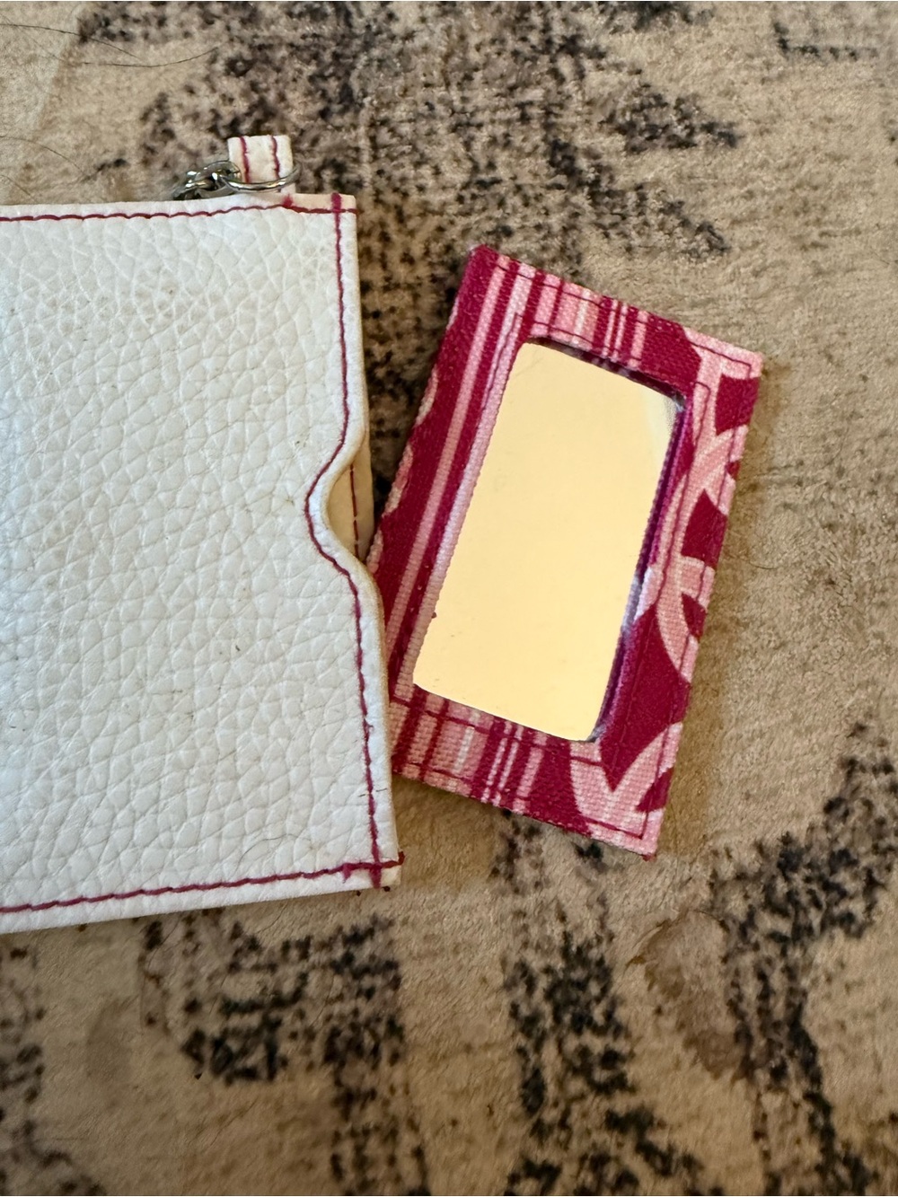 White wallet with mirror accessories